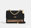 Coach Klare Crossbody Bag in Signature Canvas (Tan/Black Multi)